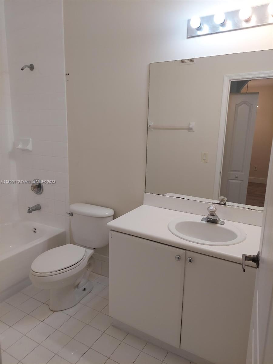 17820 NW 73rd Ave Unit: 201-1