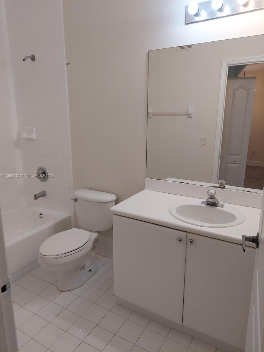 17820 NW 73rd Ave Unit: 201-1
