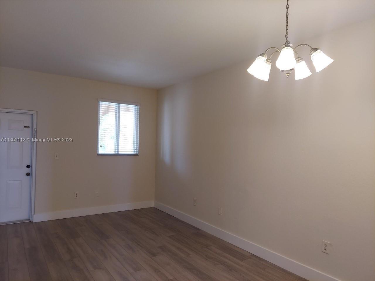 17820 NW 73rd Ave Unit: 201-1
