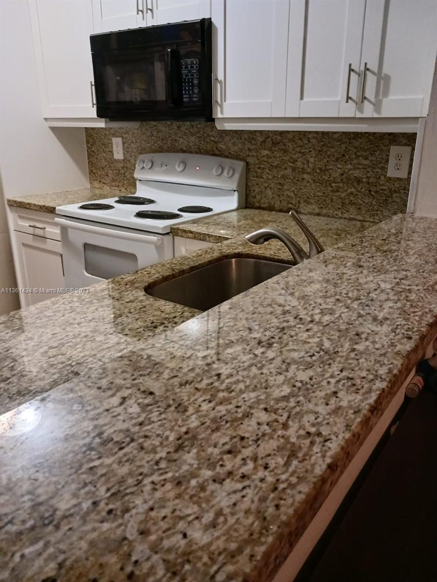 6475 SW 129th Pl Unit: 406-4