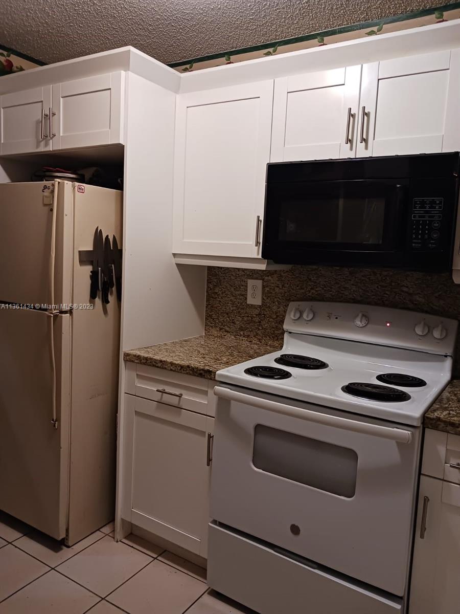 6475 SW 129th Pl Unit: 406-4