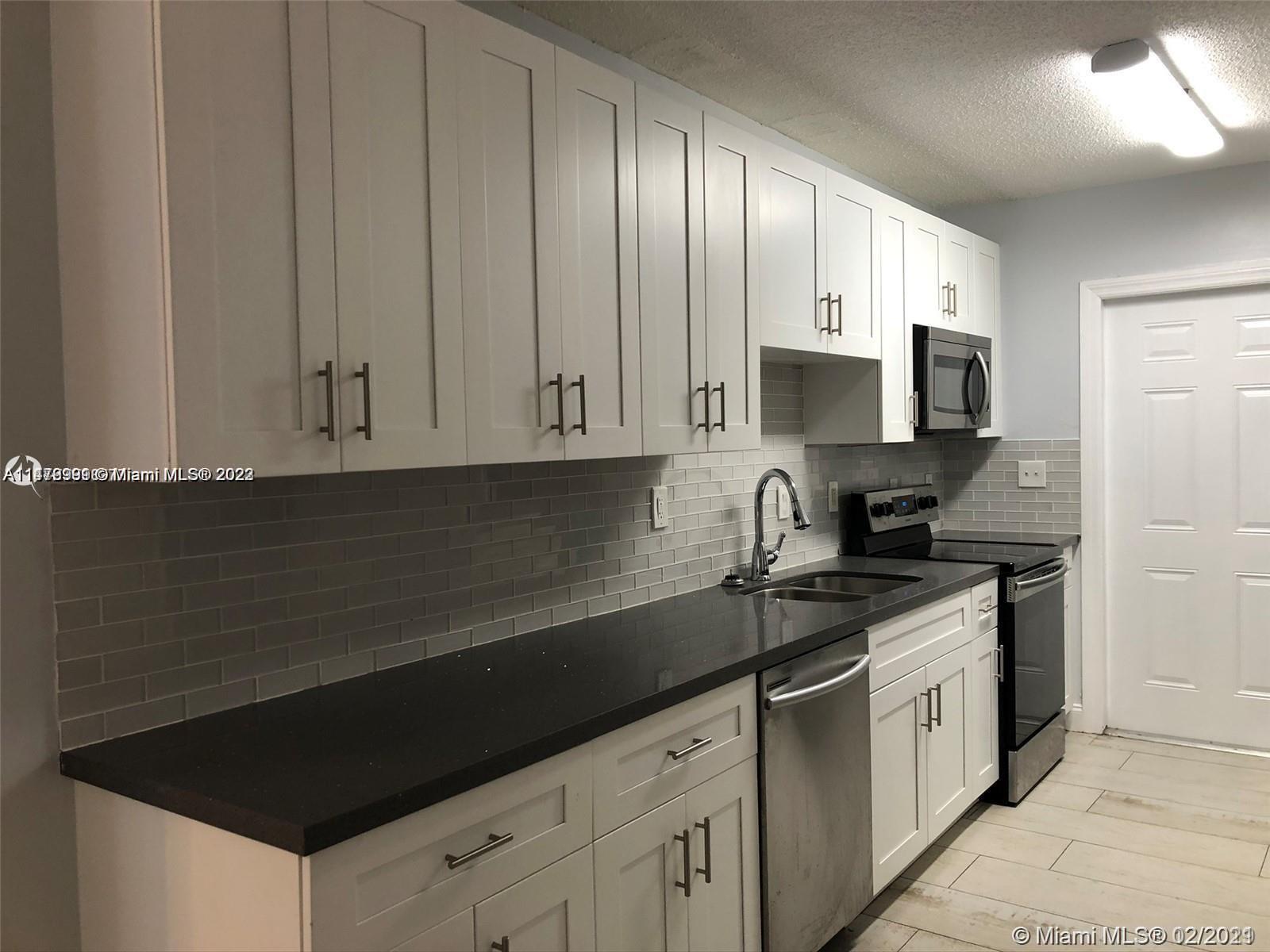 1235 NE 3rd Ave # 2