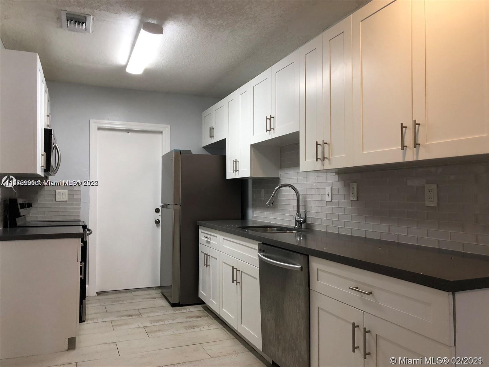 1235 NE 3rd Ave # 2