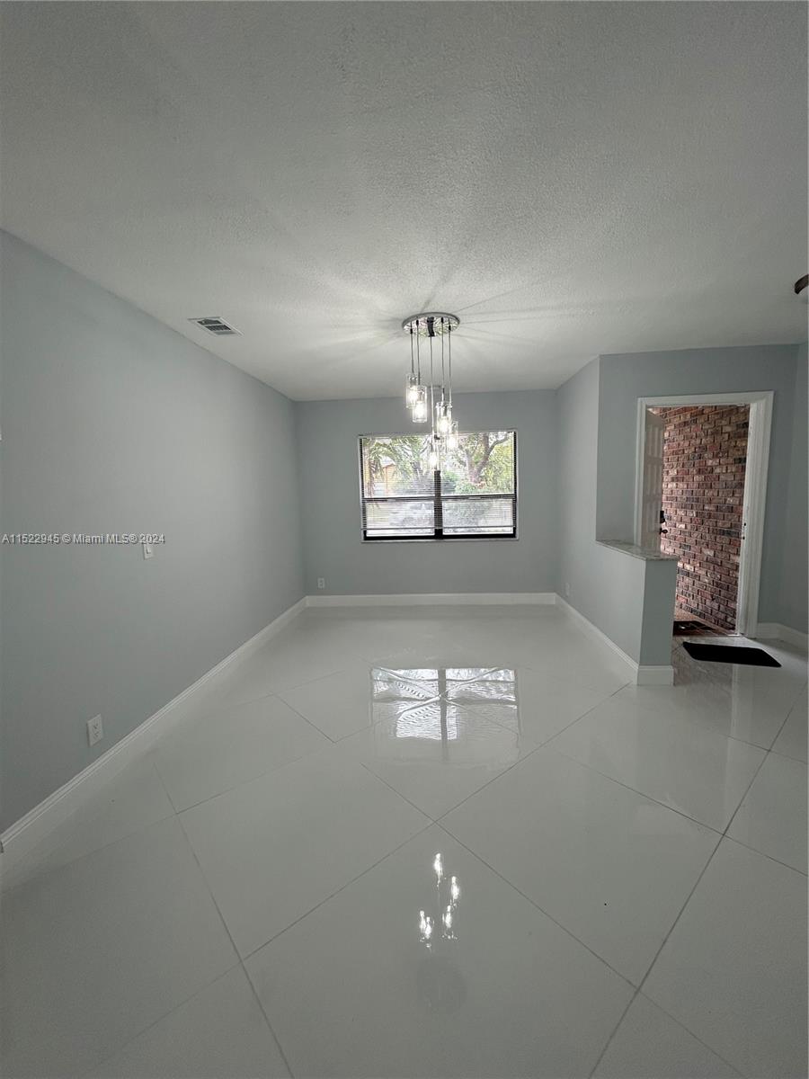 9071 NW 13th St