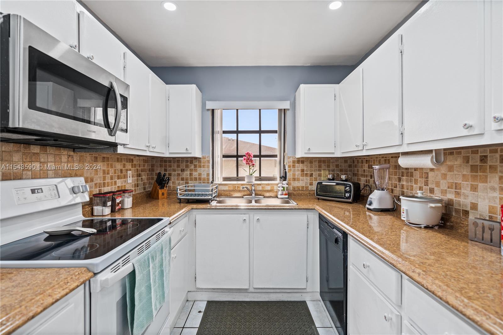 13953 SW 46th Ter # D Unit: 114 D