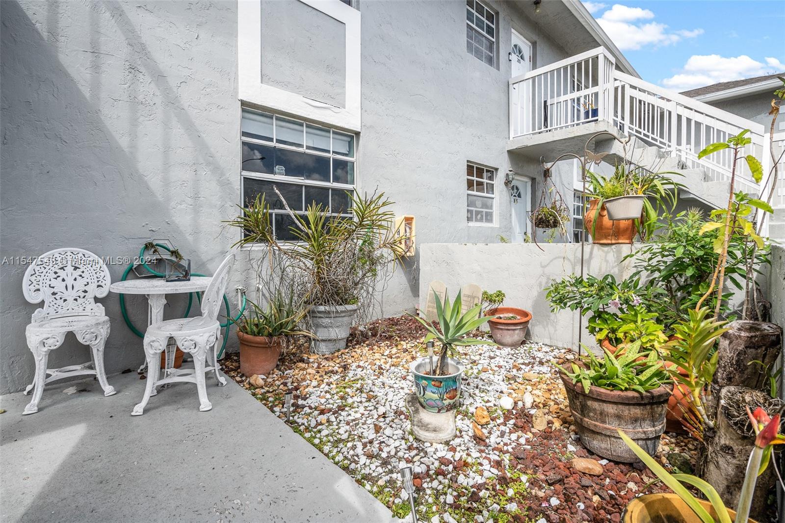 438 NE 210th Cir Ter # 4B Unit: 104-4B