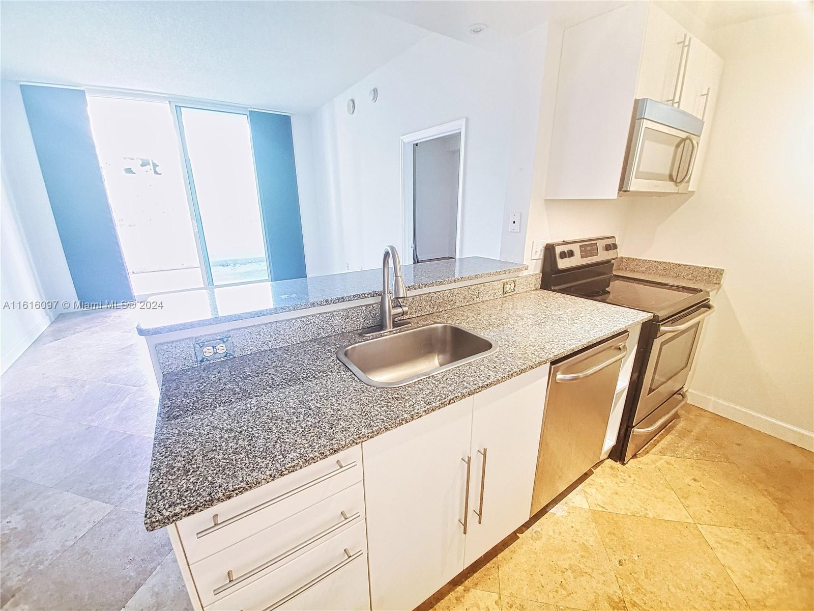 275 NE 18th St # 203