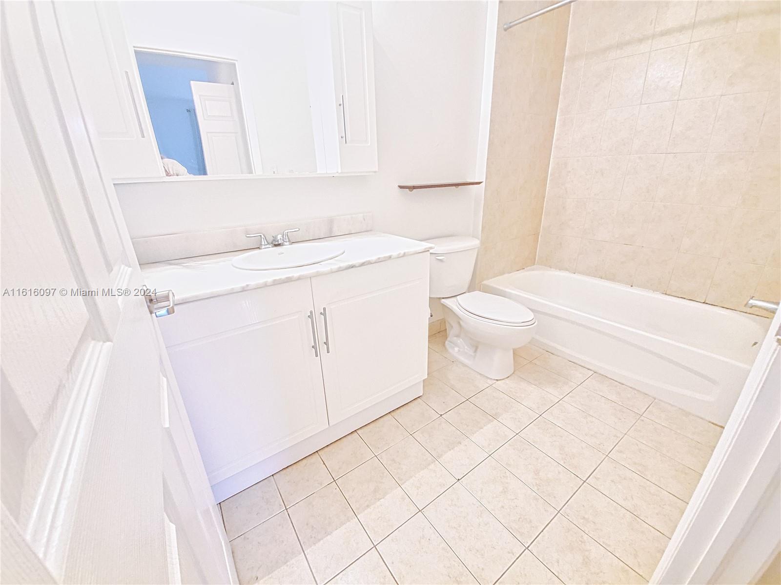 275 NE 18th St # 203