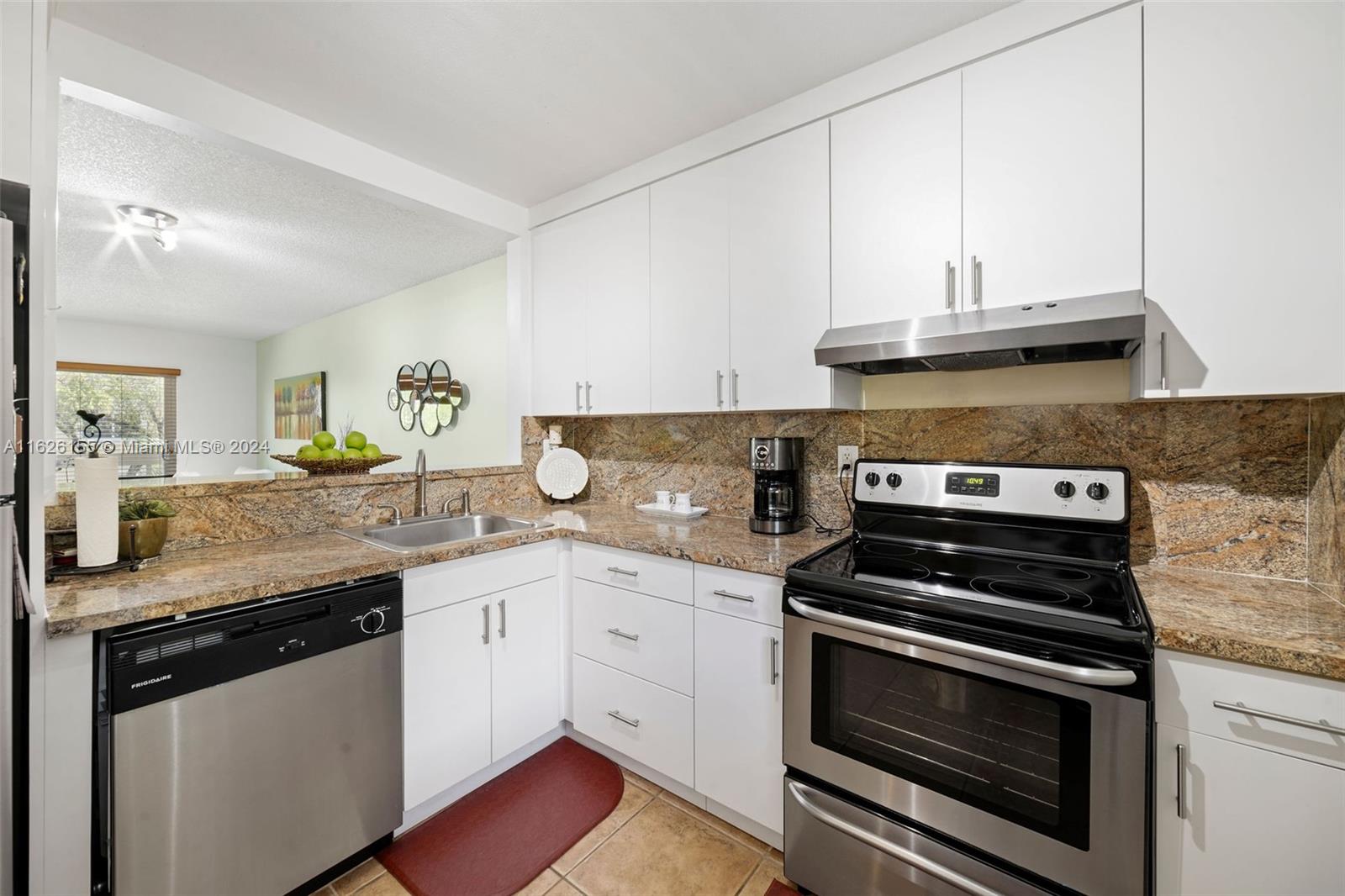 7720 Camino Real # 205 Unit: E-205