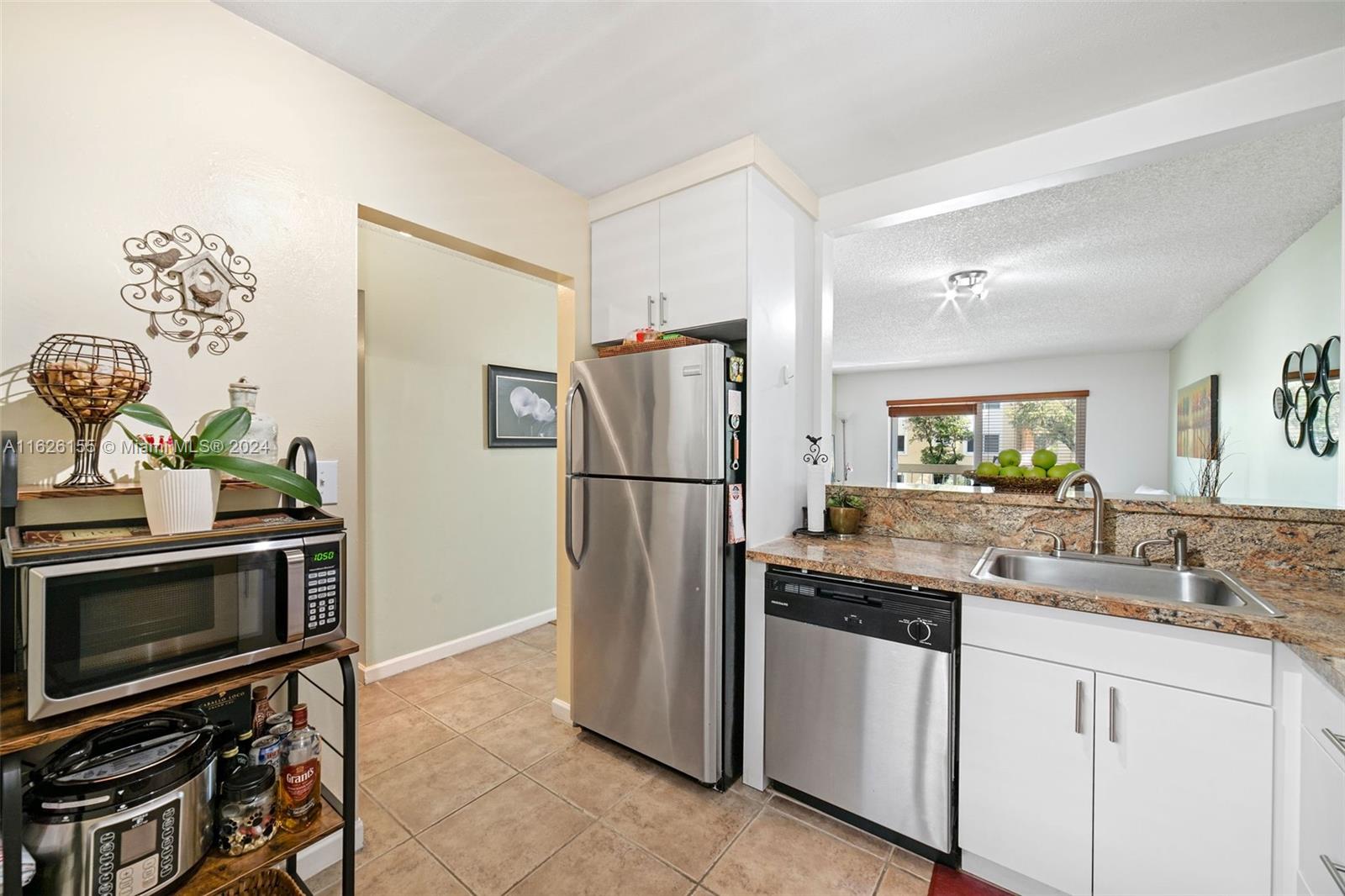 7720 Camino Real # 205 Unit: E-205