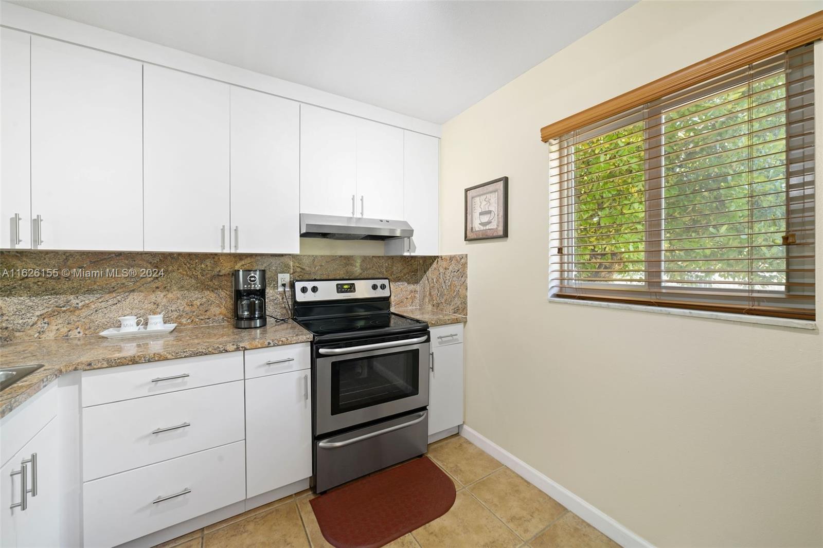 7720 Camino Real # 205 Unit: E-205