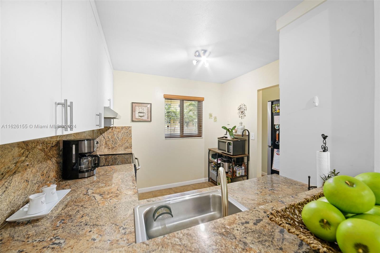7720 Camino Real # 205 Unit: E-205