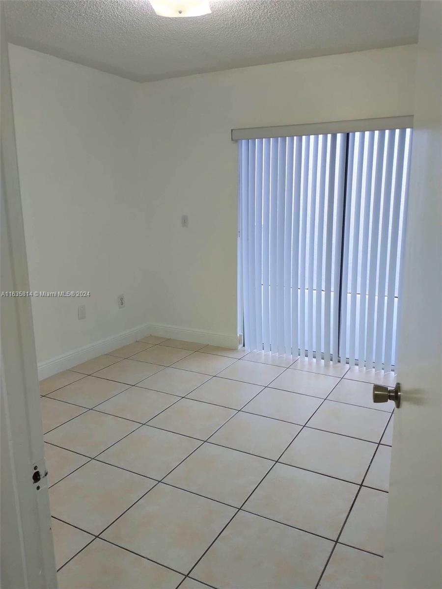 2750 W 76th St # 208