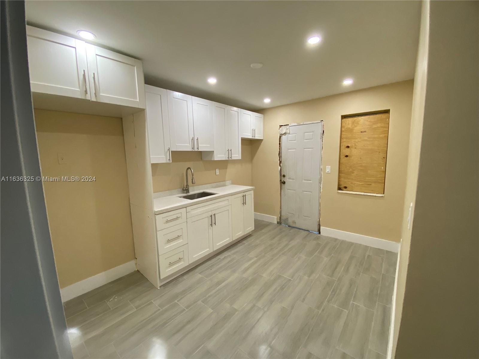 234 NE 55th Ter # 1