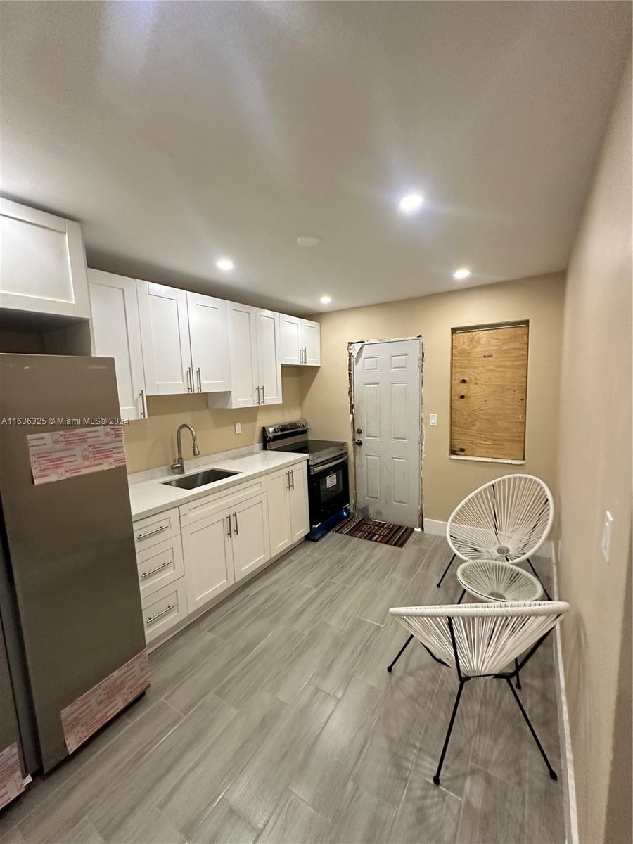 234 NE 55th Ter # 1