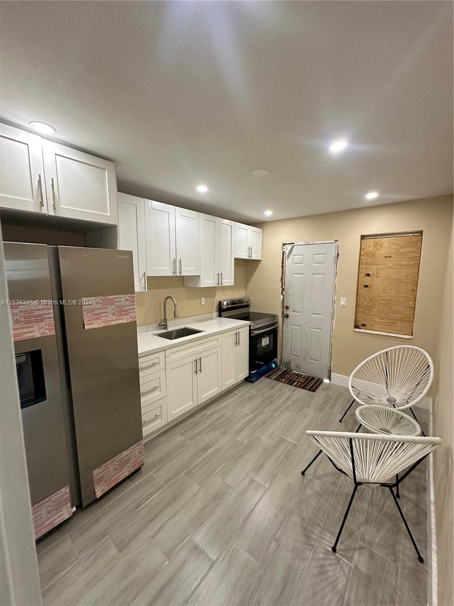 234 NE 55th Ter # 1