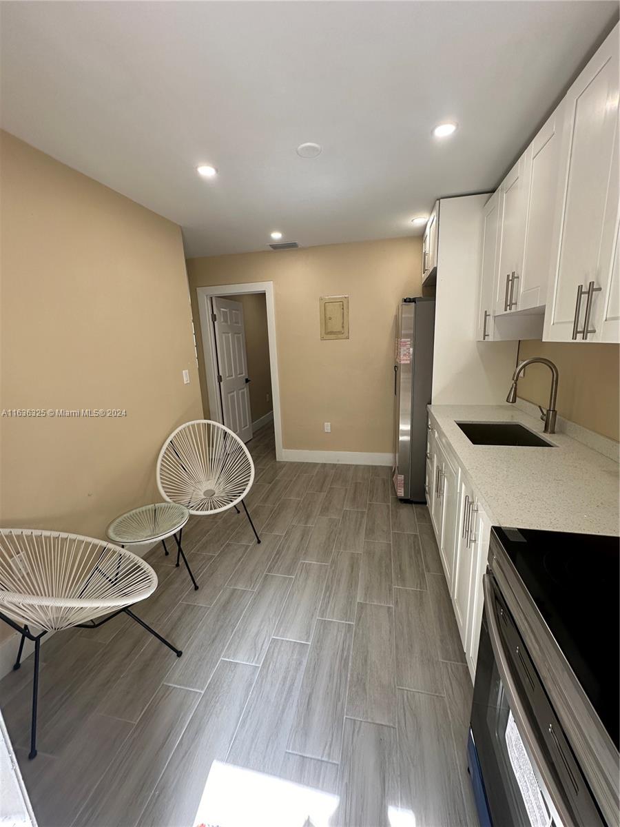 234 NE 55th Ter # 1
