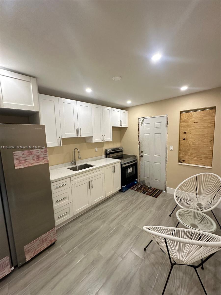 234 NE 55th Ter # 1