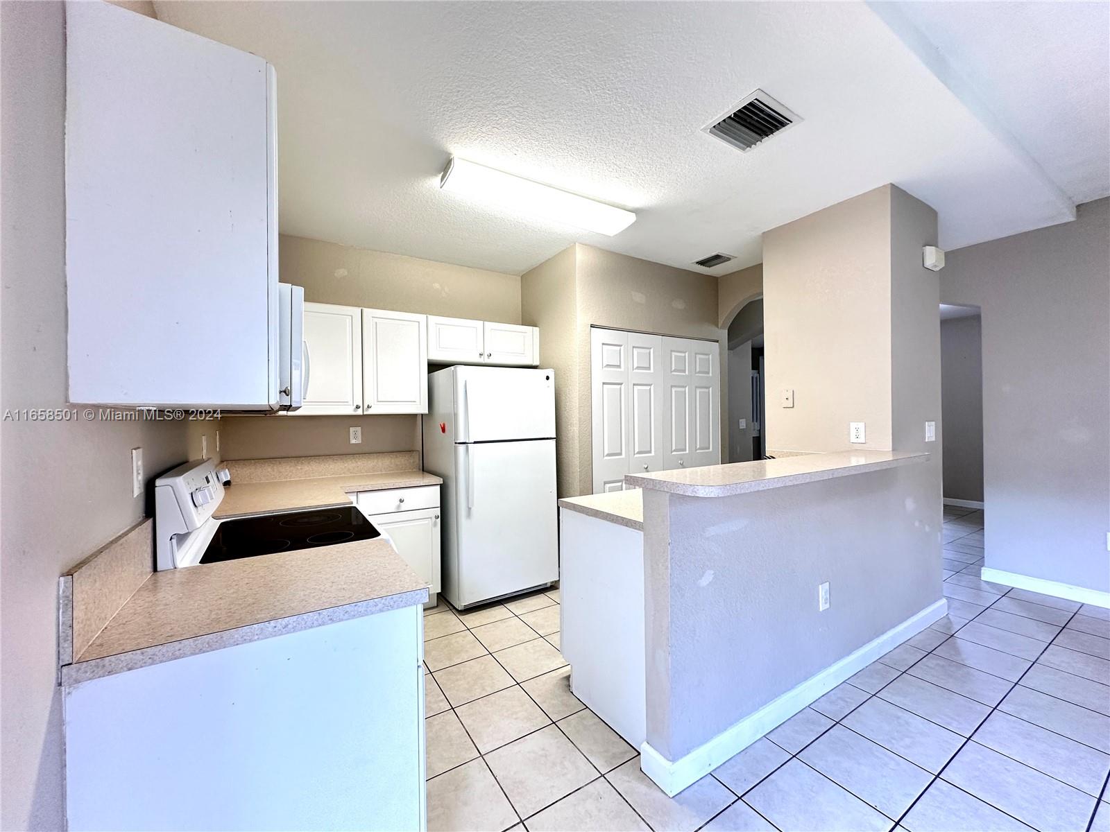 1575 NE 33rd Ave # 9 Unit: 103-9