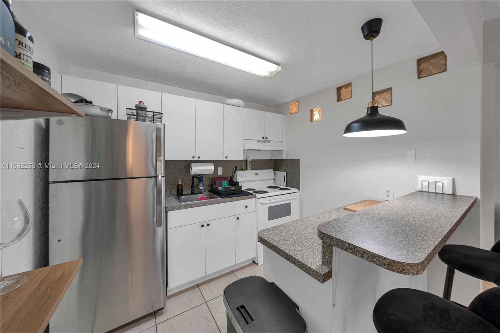 4275 NW South Tamiami Canal Dr # 103 Unit: 2-103