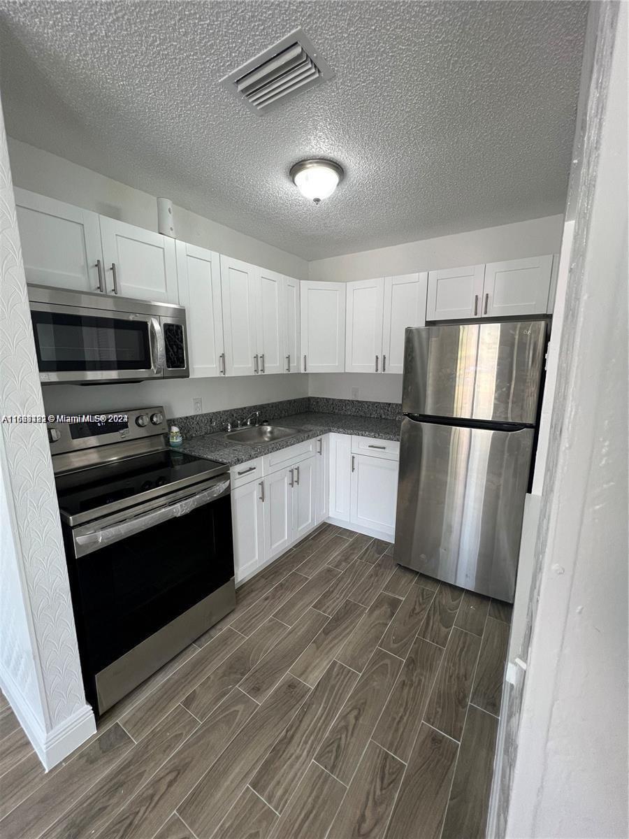 840 SW 6th Ct # 3 Unit: 1-3
