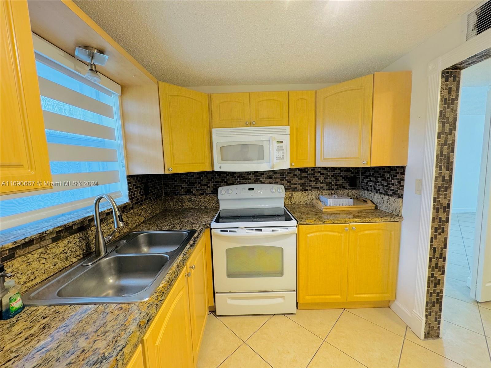 9359 FONTAINEBLEAU BL # 106 Unit: F-106