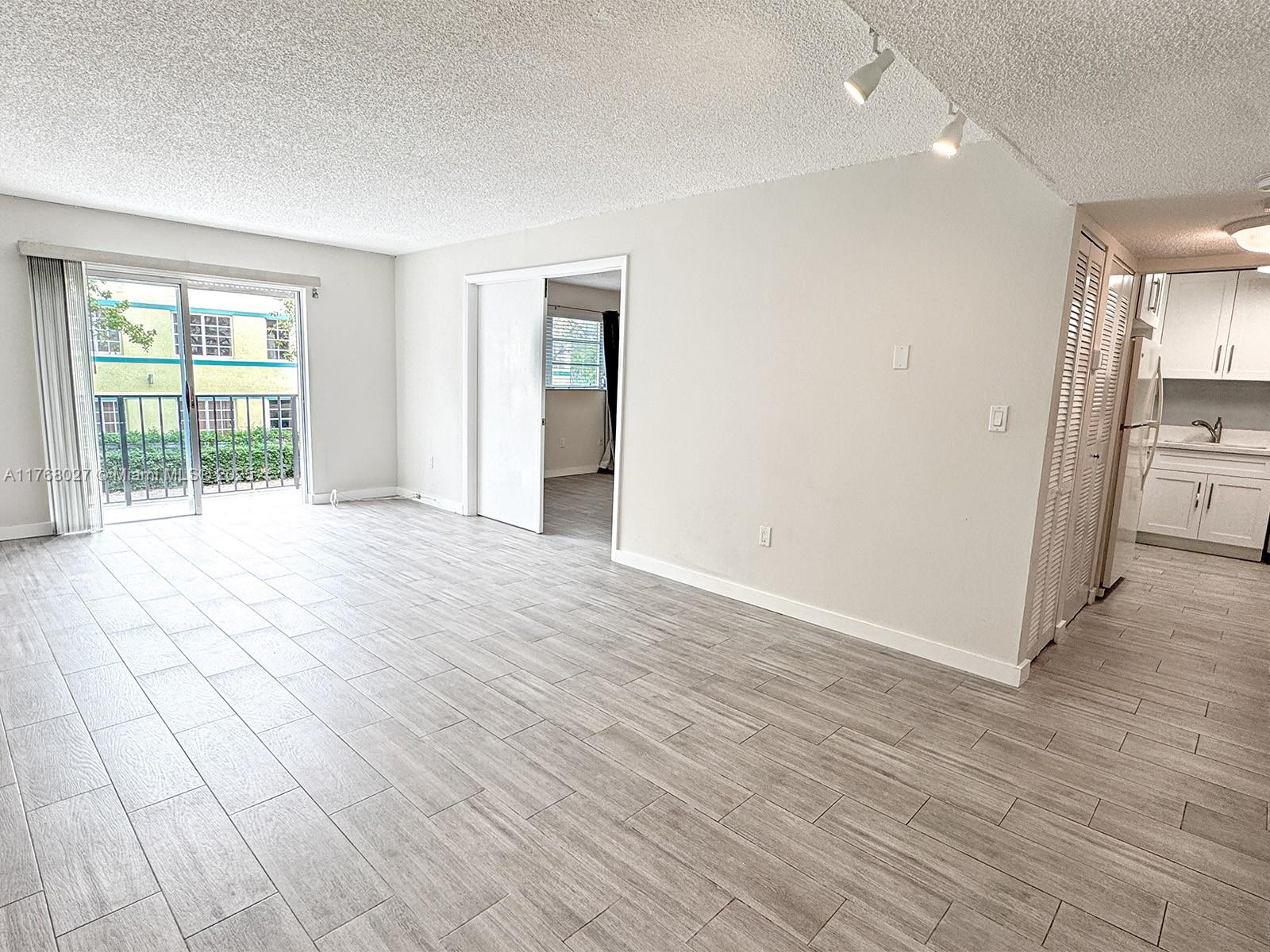 6965 Harding Ave # 205