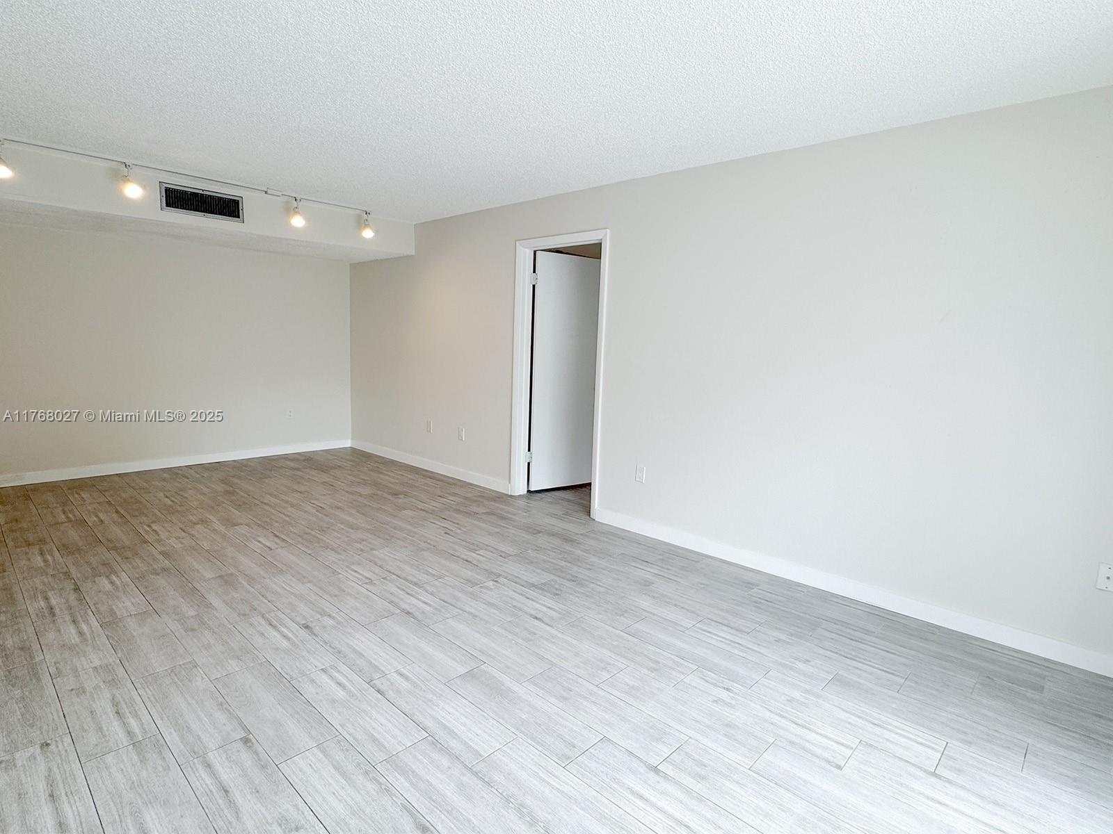 6965 Harding Ave # 205