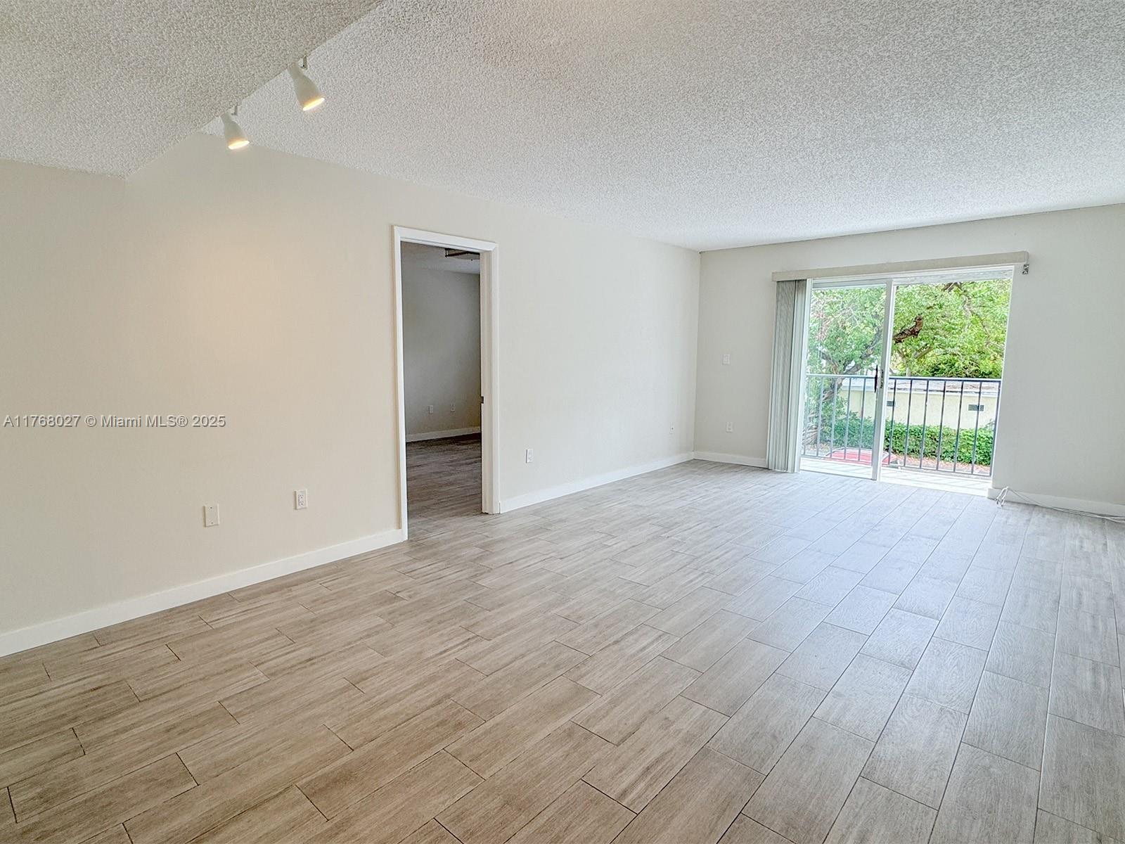 6965 Harding Ave # 205