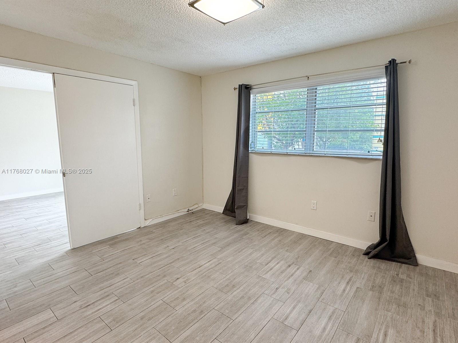 6965 Harding Ave # 205