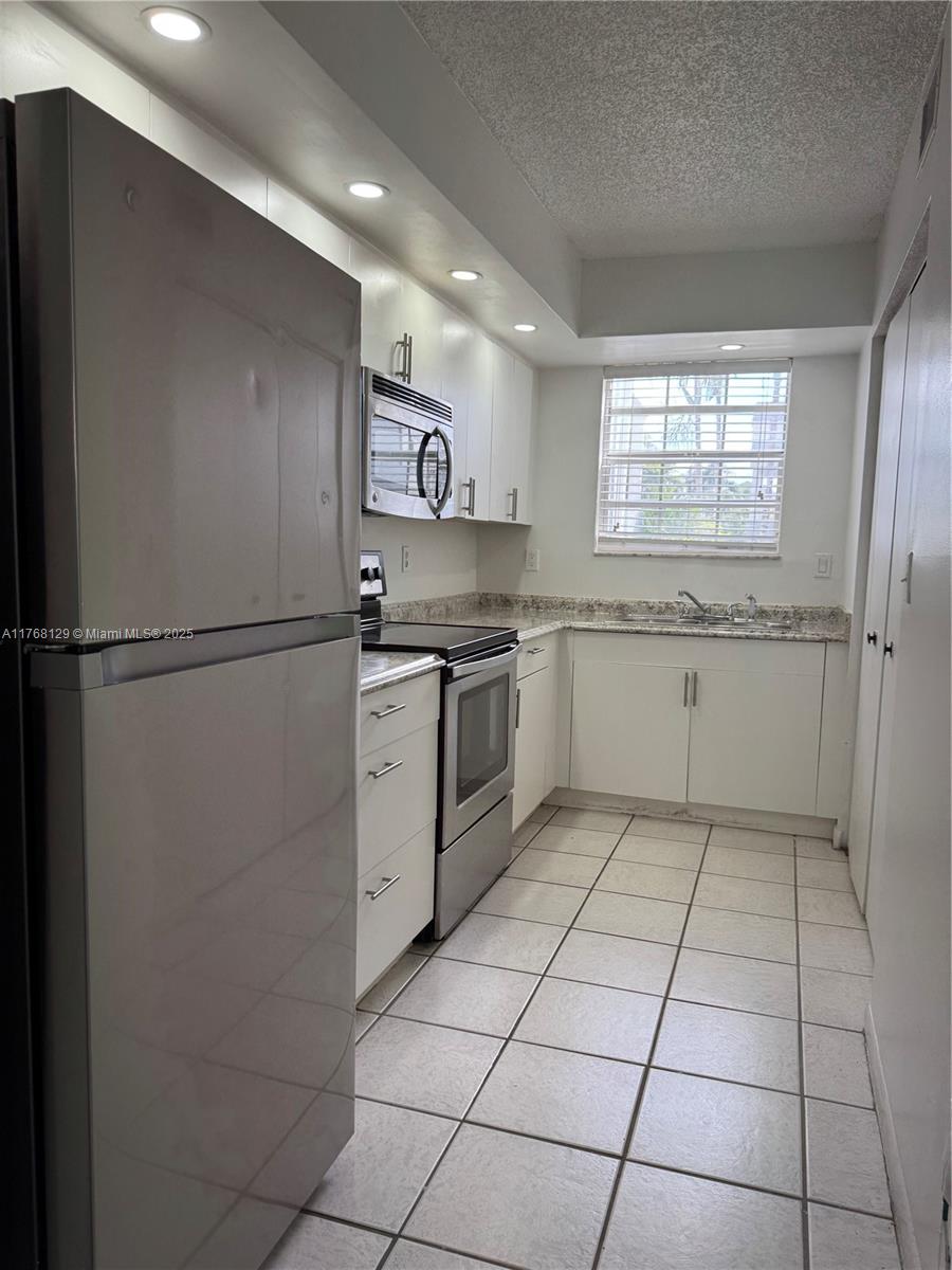 2011 SE 27th Dr # B Unit: 102-B