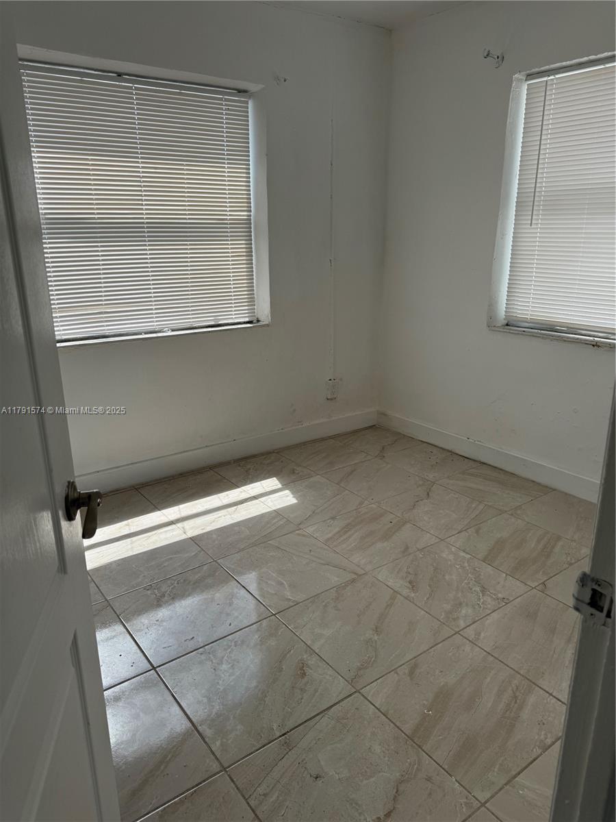 100 NW 1st Ave # 100