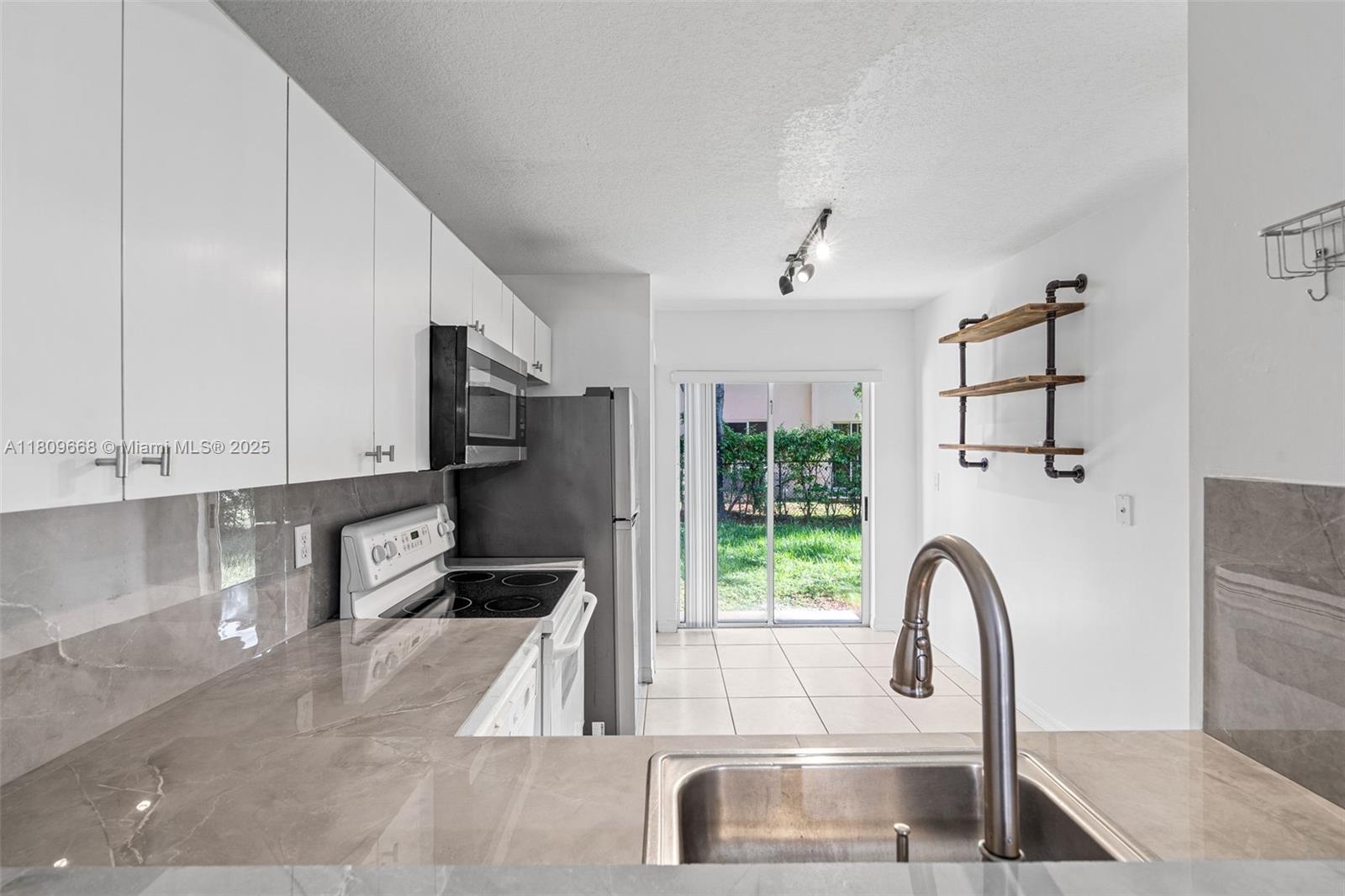 1261 SE 29th St # 25 Unit: 103-25