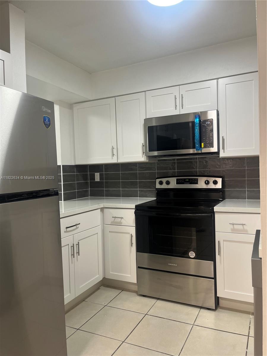 14931 SW 82nd Ln # 103 Unit: 18-103