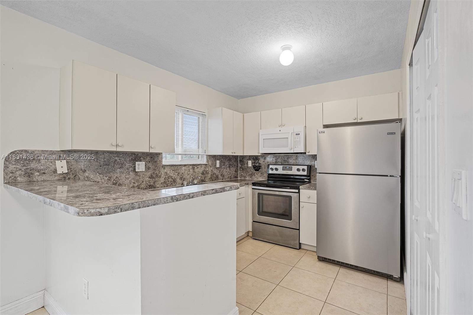 980 NE 33rd Ter # 104