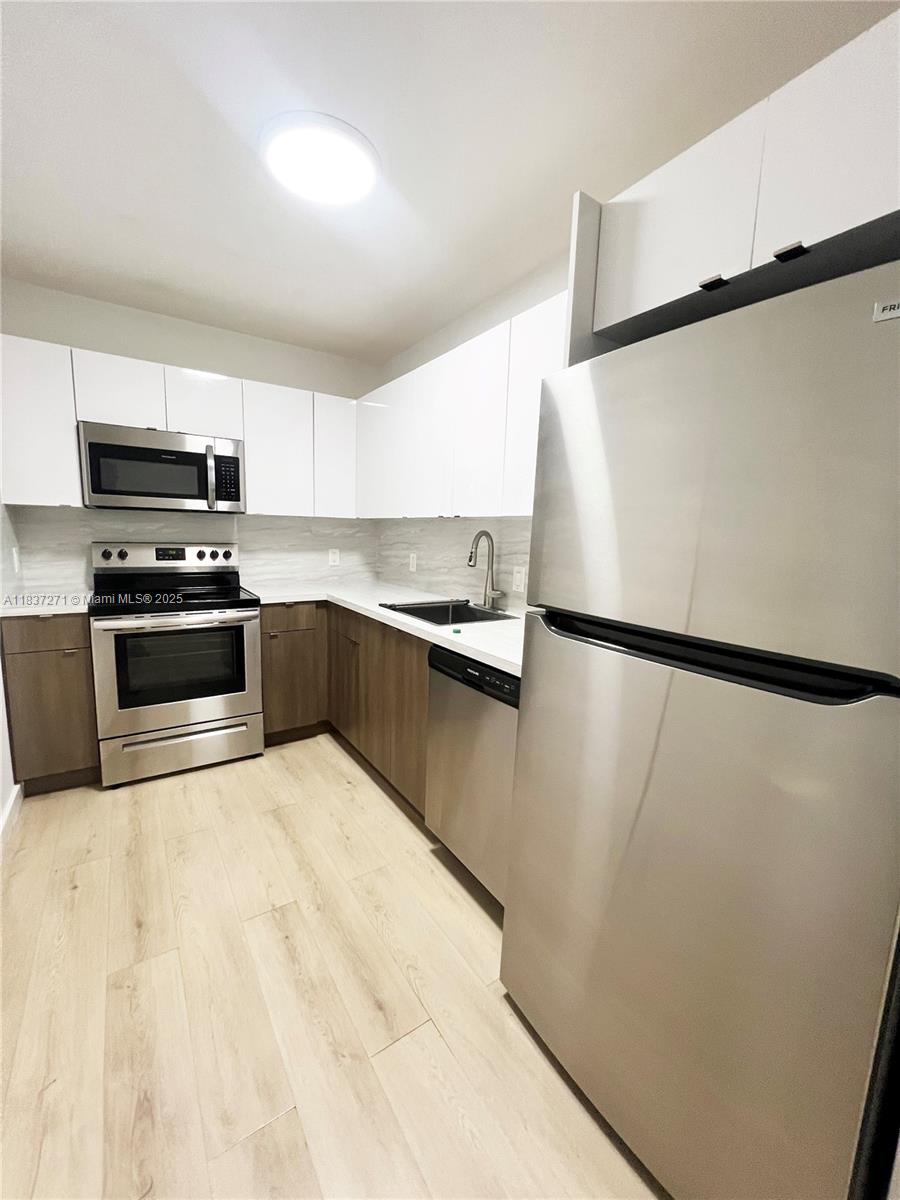 717 SW 11th Ave # 208