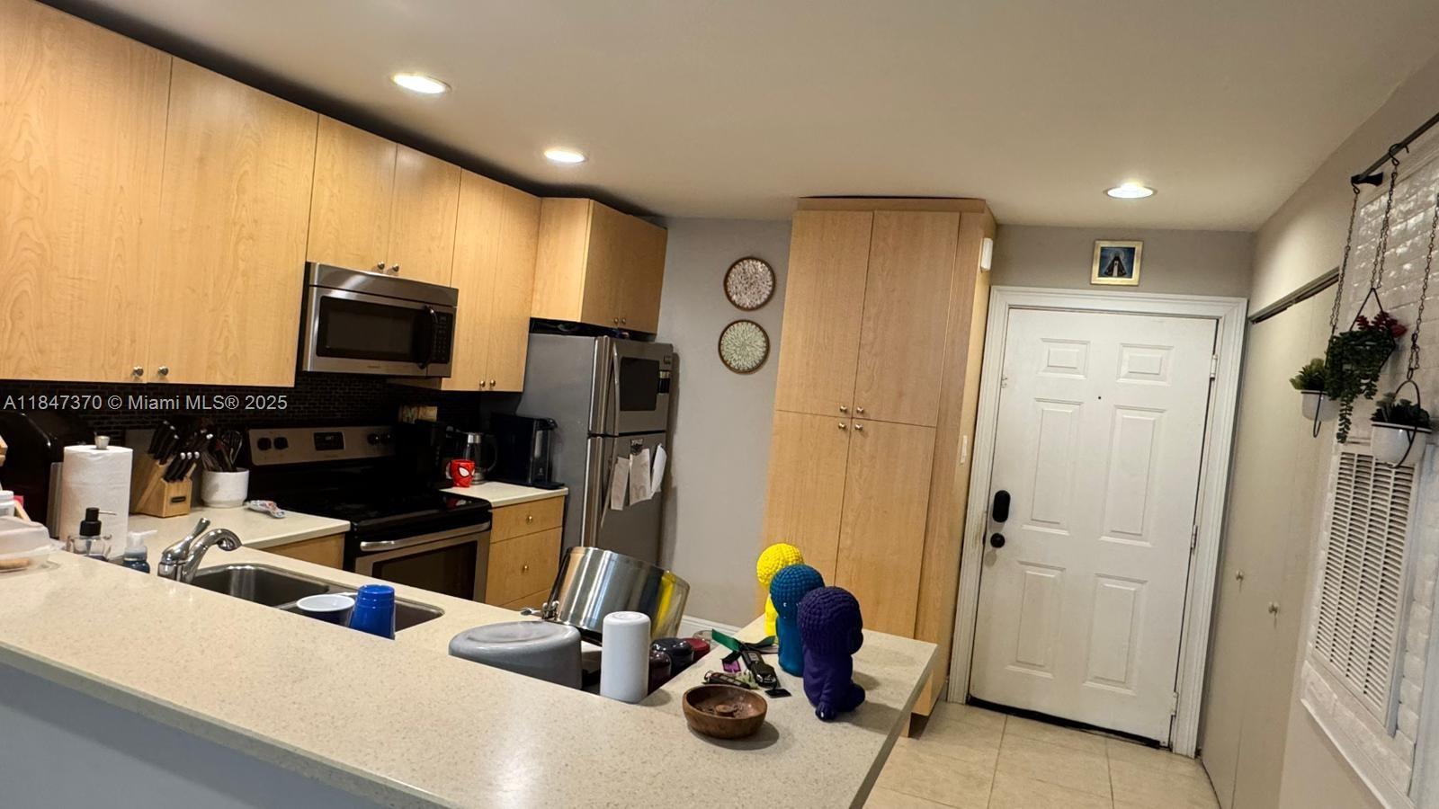 1705 Palm Cove Blvd # 105 Unit: 1-105