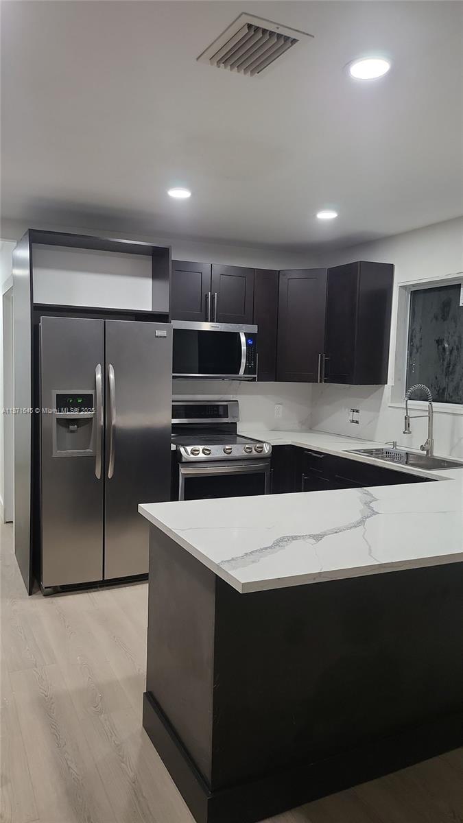 2310 NW 103rd St Unit: Front