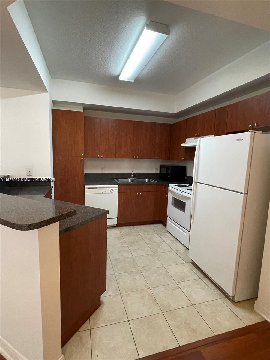 115 SW 11th St # 605