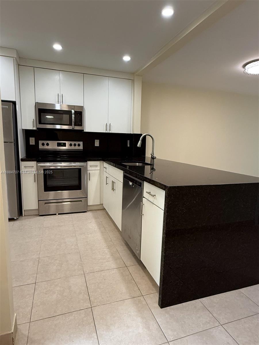 8101 Camino Real # C220