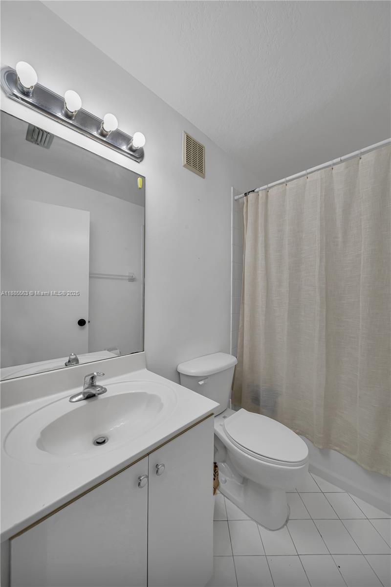 1261 SE 27th St # 203