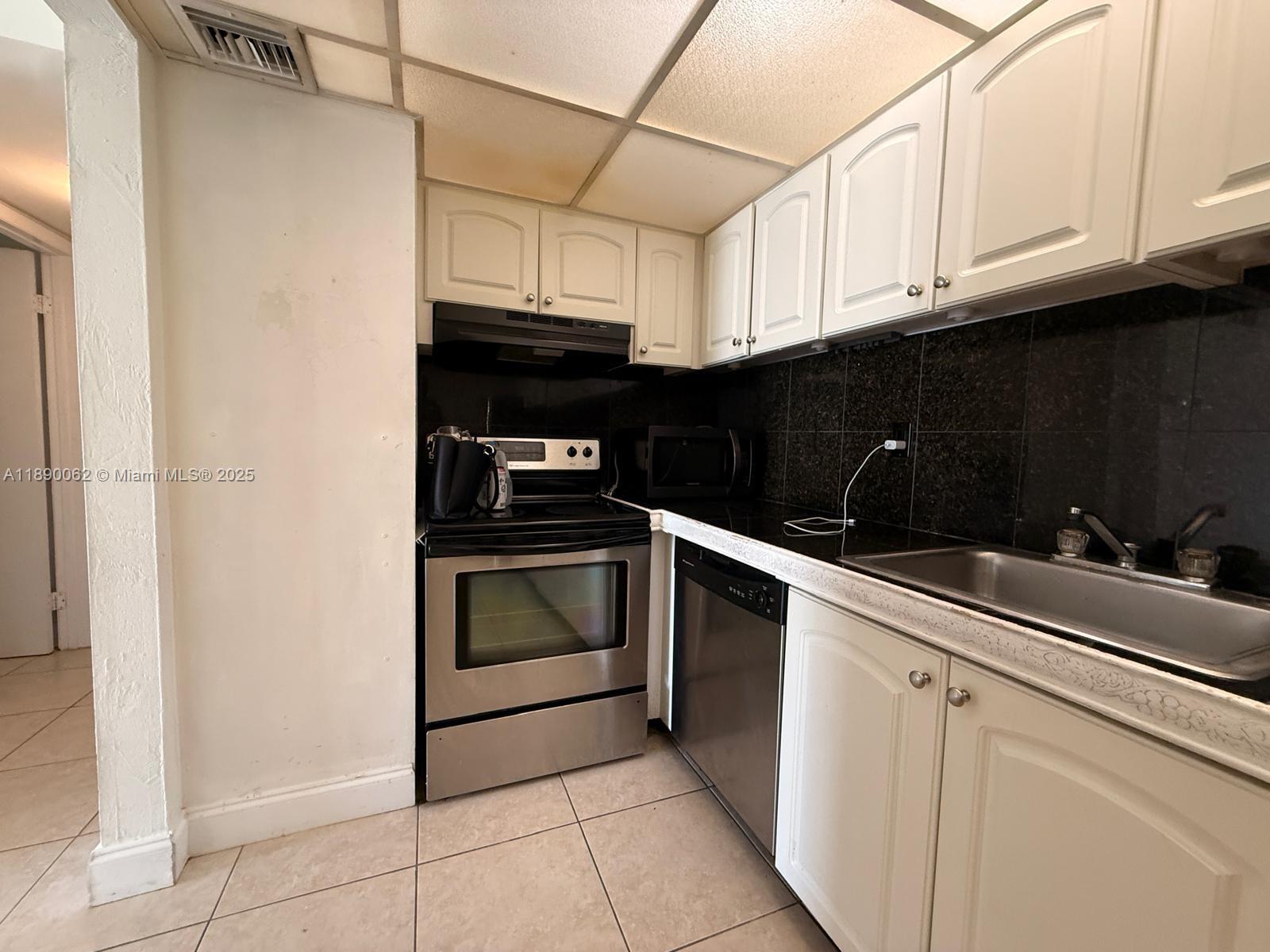 13890 SW 90th Ave Unit: 205-HH