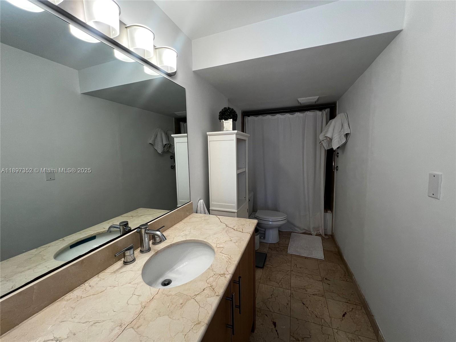 10275 Collins Ave # 214