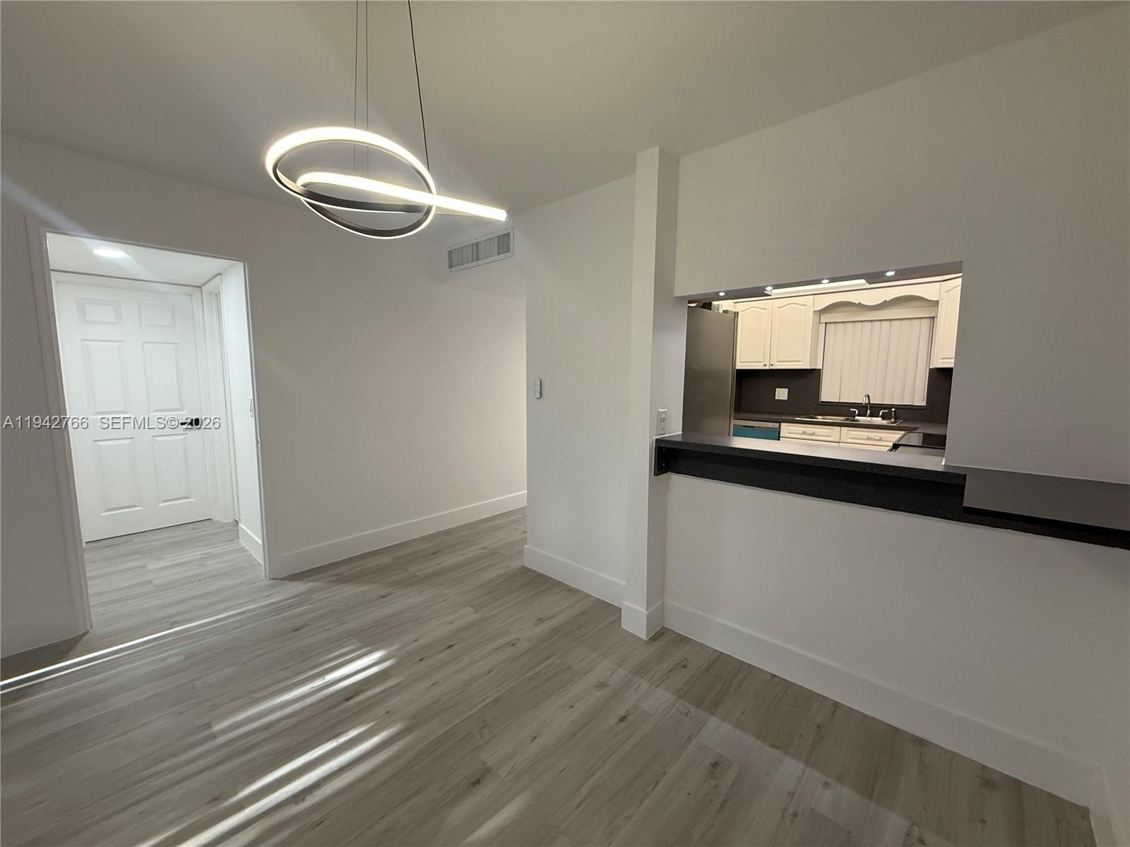 9470 Live Oak Pl # 104