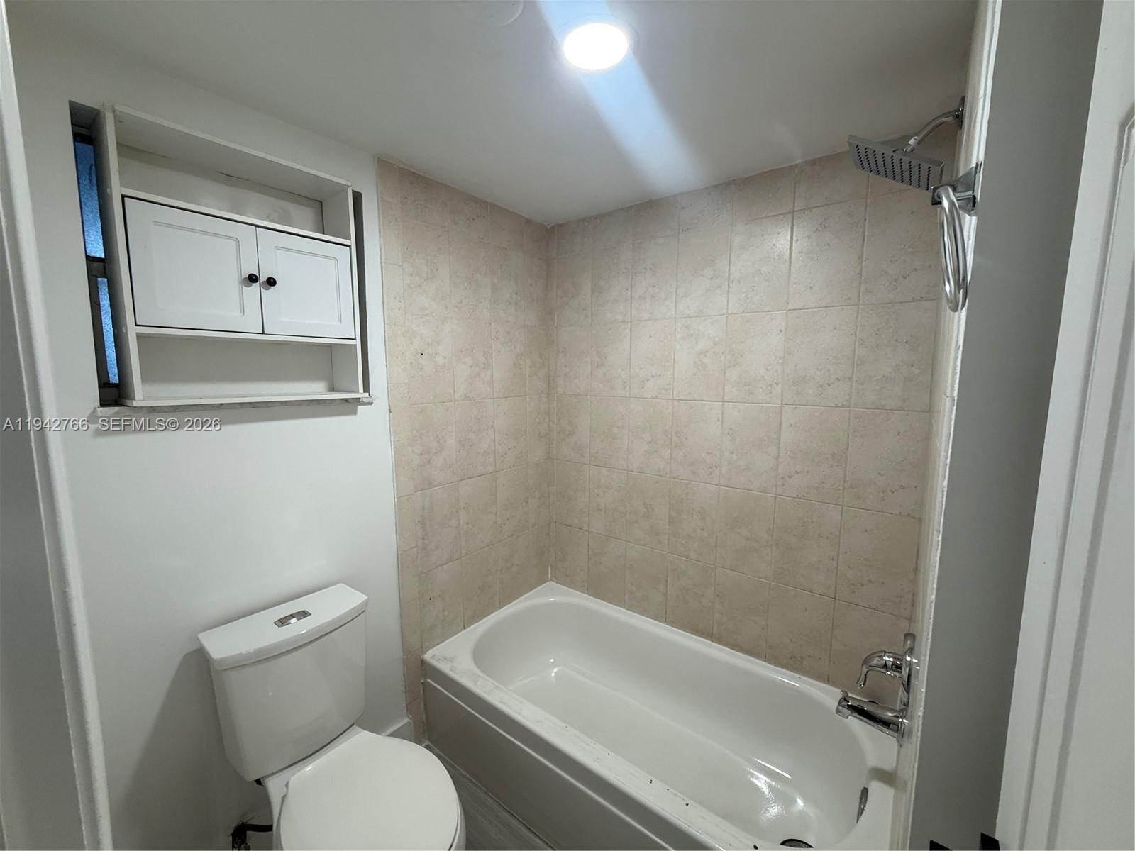 9470 Live Oak Pl # 104
