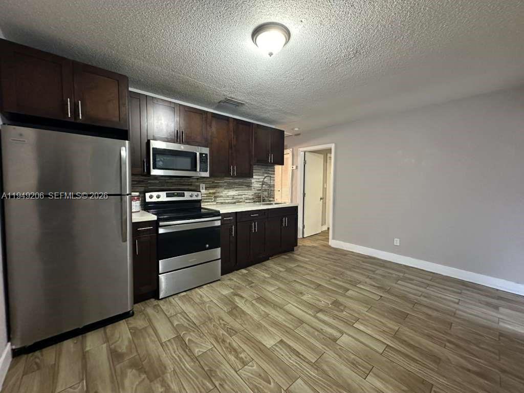647 NW 3rd Ave # 3