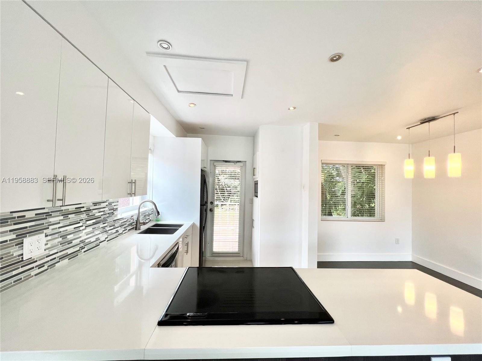 125 NW 100th St