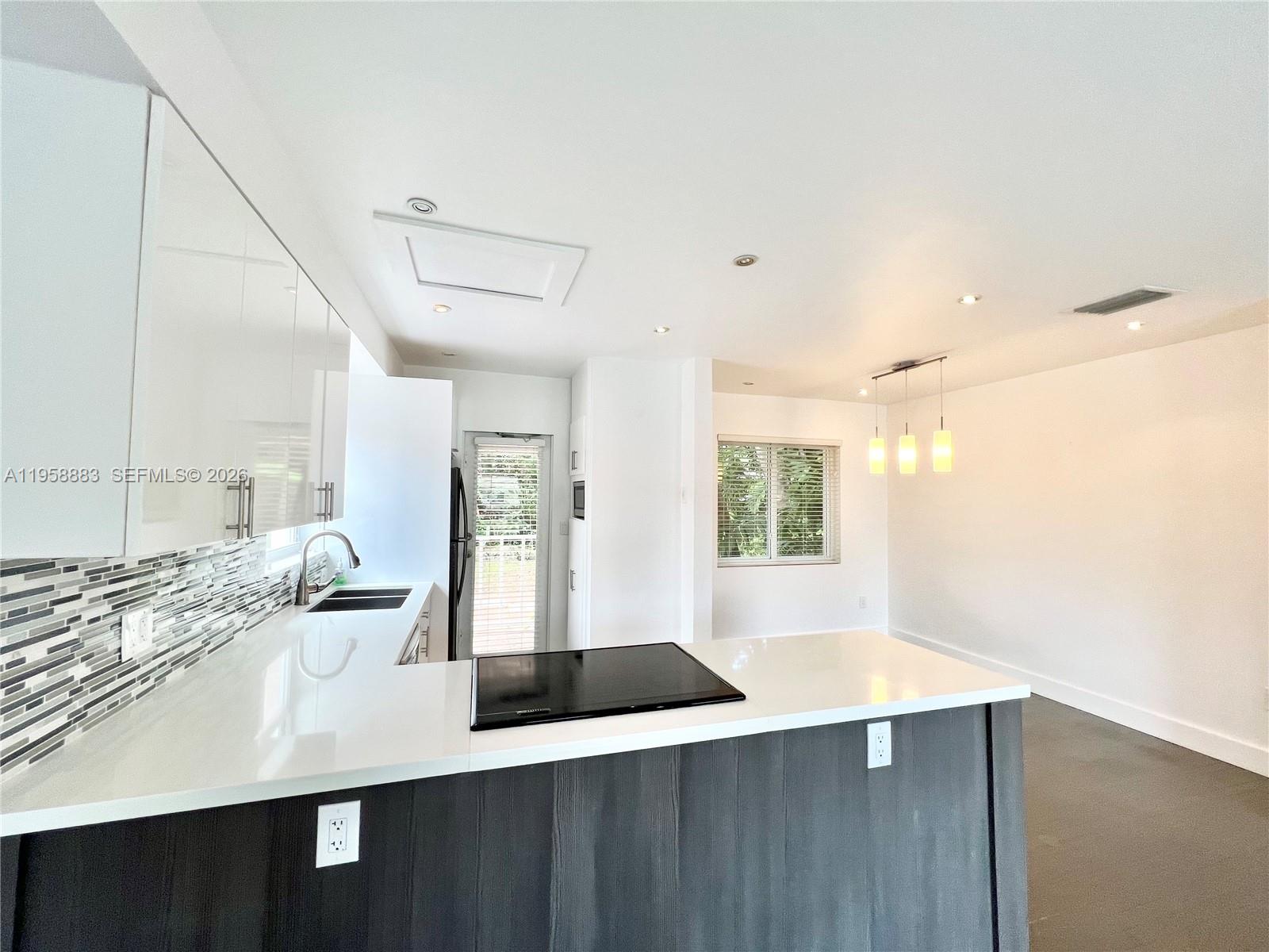 125 NW 100th St