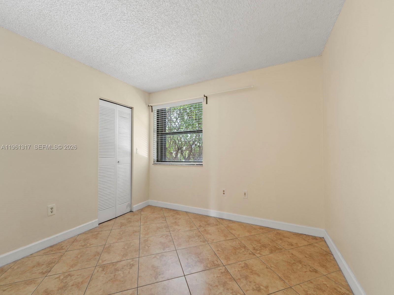 10020 NW 9th St Cir # 202