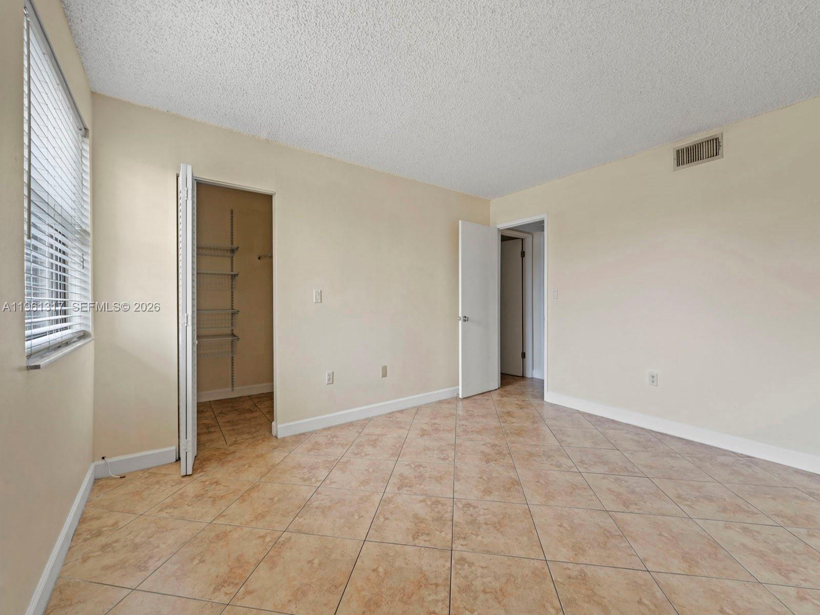 10020 NW 9th St Cir # 202